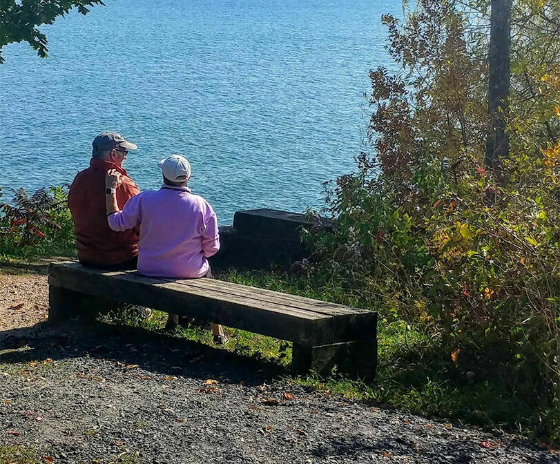 couple on bench in washburn wi